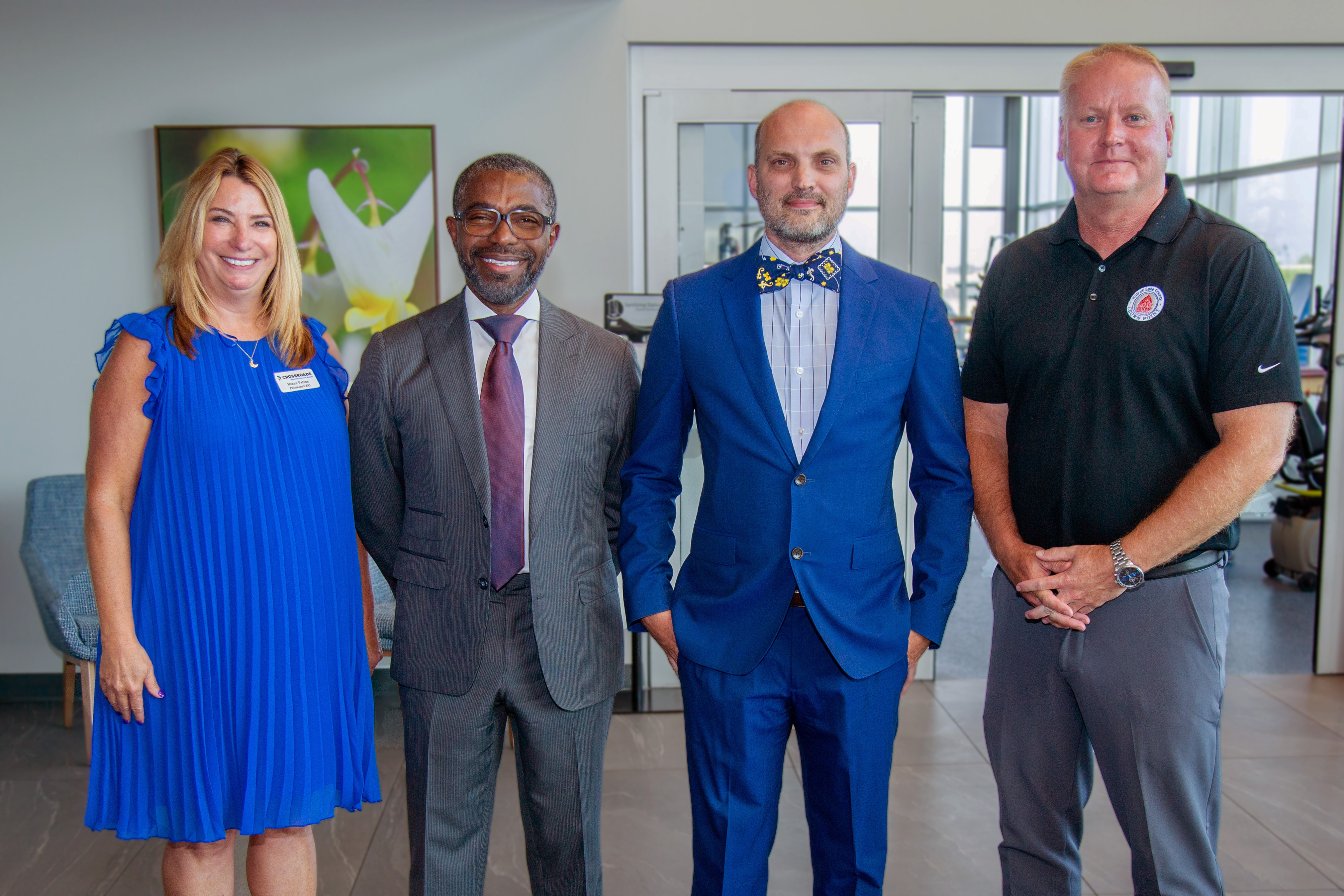 Deanna Patena, Crossroads Chamber president & CEO, Crown Point's Mayor, Pete Land, Dr. Dwight Tyndall, Dr. Aaron Anderson, LBJI president