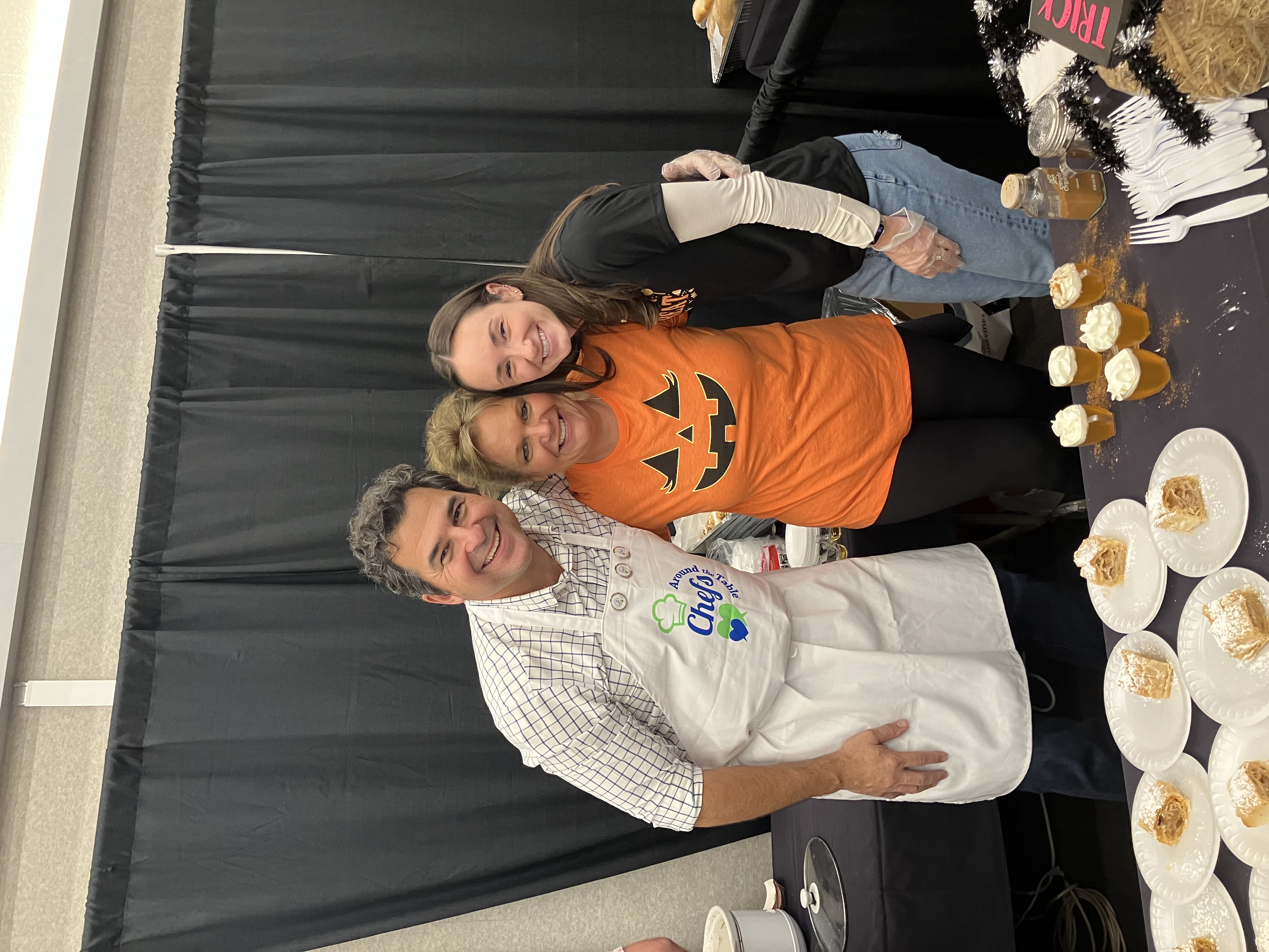 Nick Nenadovich, M.D. with two ladies smiling at the camera